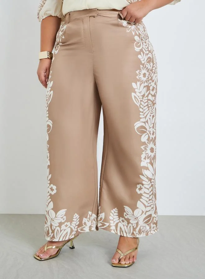 ستايلي بنطال نسائي بنقشة زهور وأرجل واسعة مقاس كبير